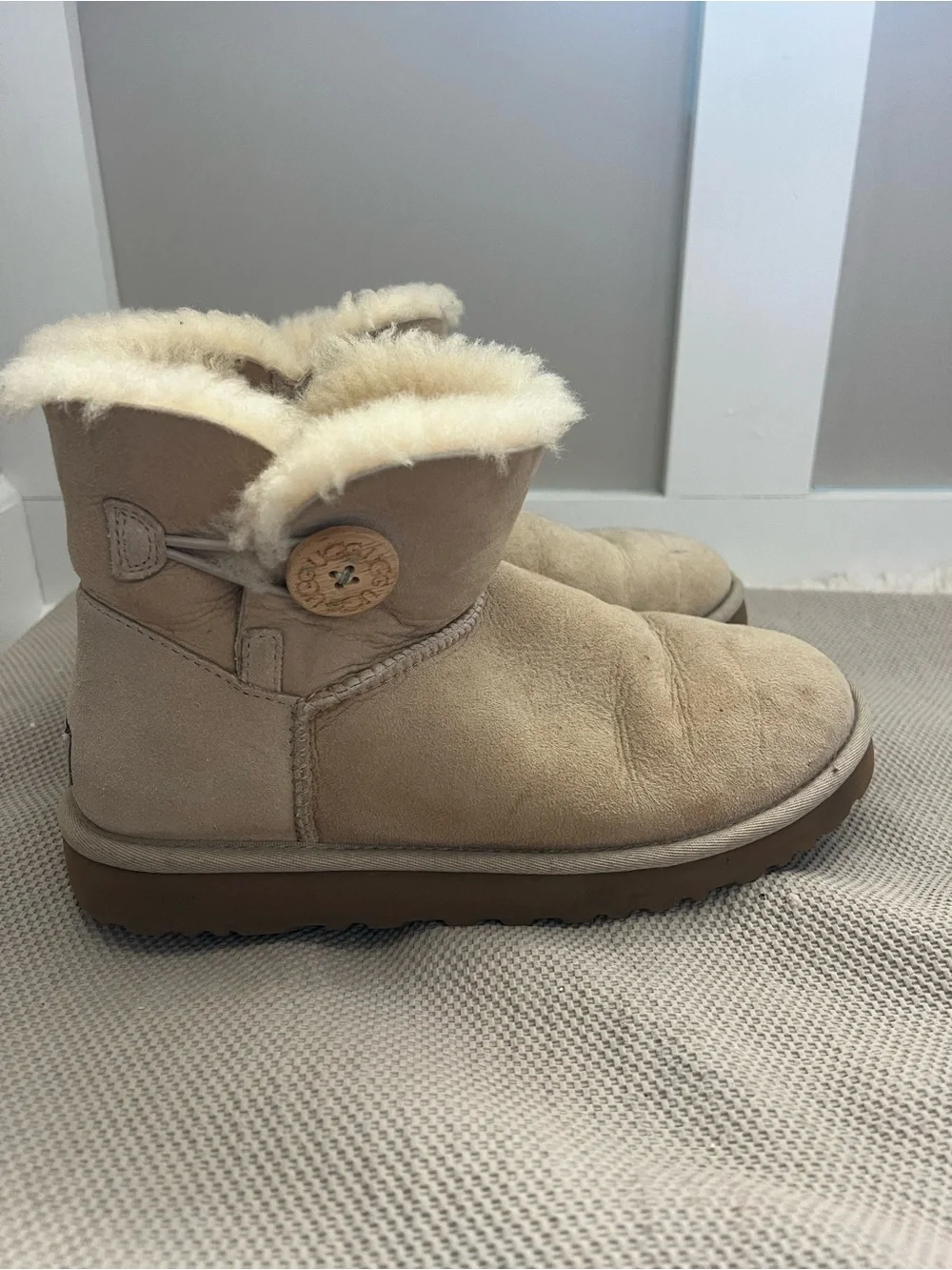 UGG Mini Button Boot in Sand with Shearling Trim